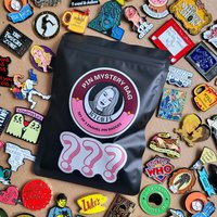 Enamel Pin badge mystery bag featuring 3 enamel pin badges. Enamel pin blind bag gift.